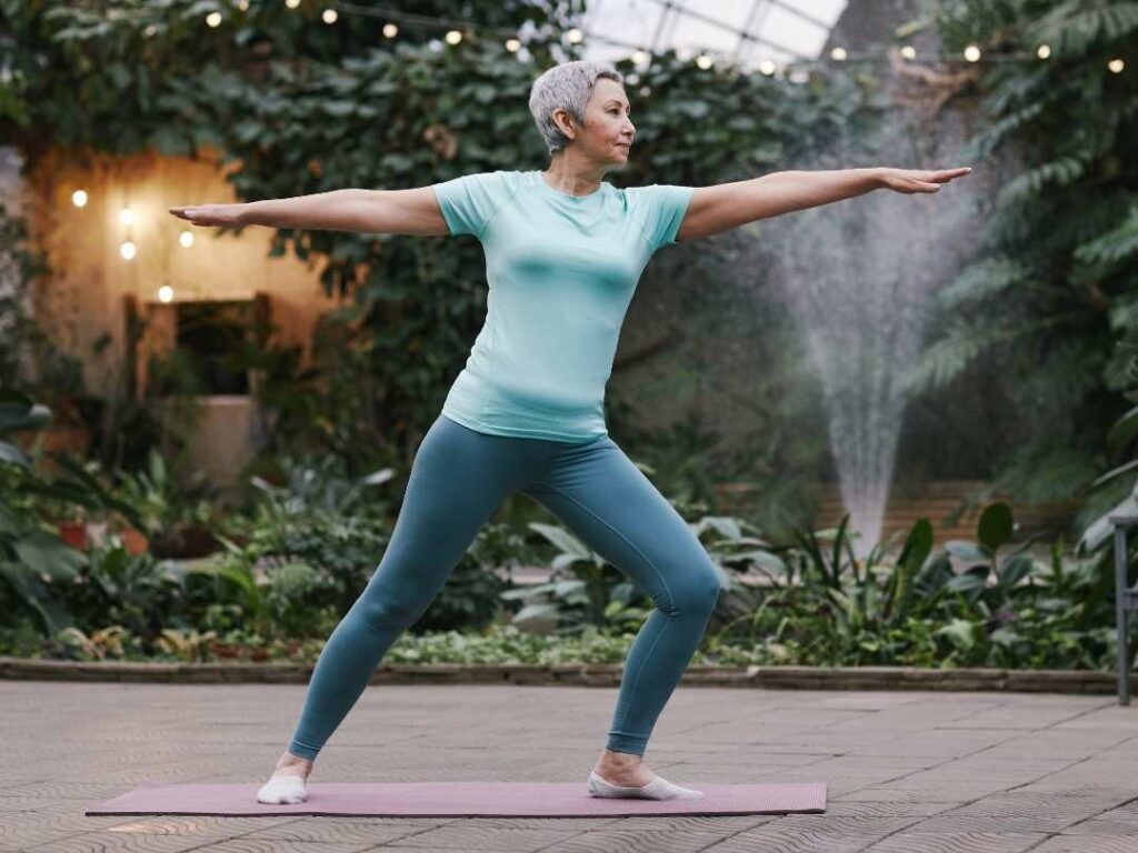 woman doing warrior 2 pose