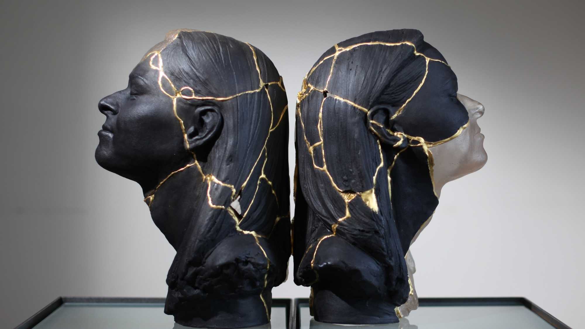 Moral Injury in healthcare - black and gold kintsugi sculptures