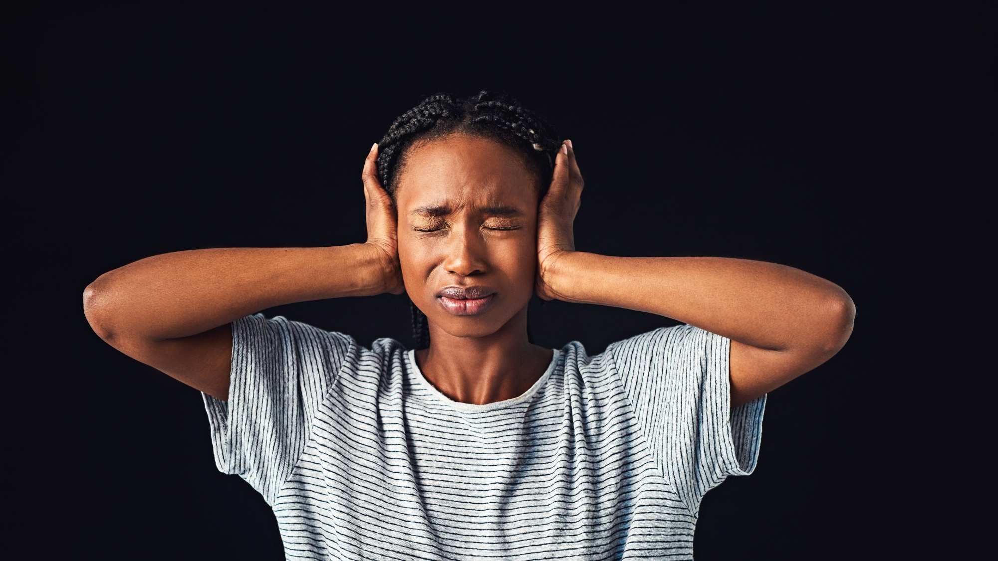 Vicarious trauma - woman blocking her ears