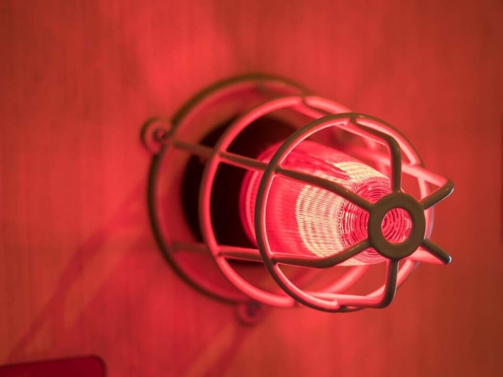 red alarm on red background